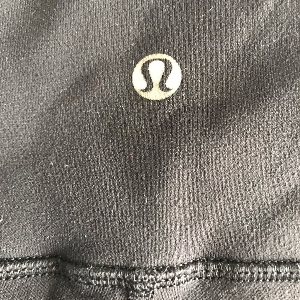 Lululemon set size 12. Racer back top with mesh accent and capri leggings